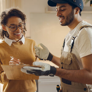 Customer and repairperson at end of job